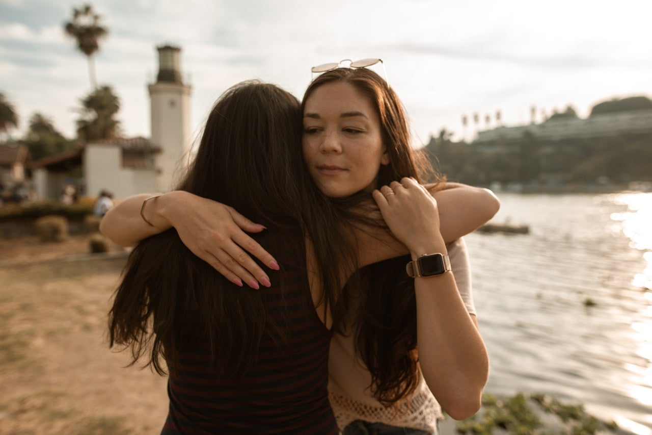 sisters discussing opioid use disorder