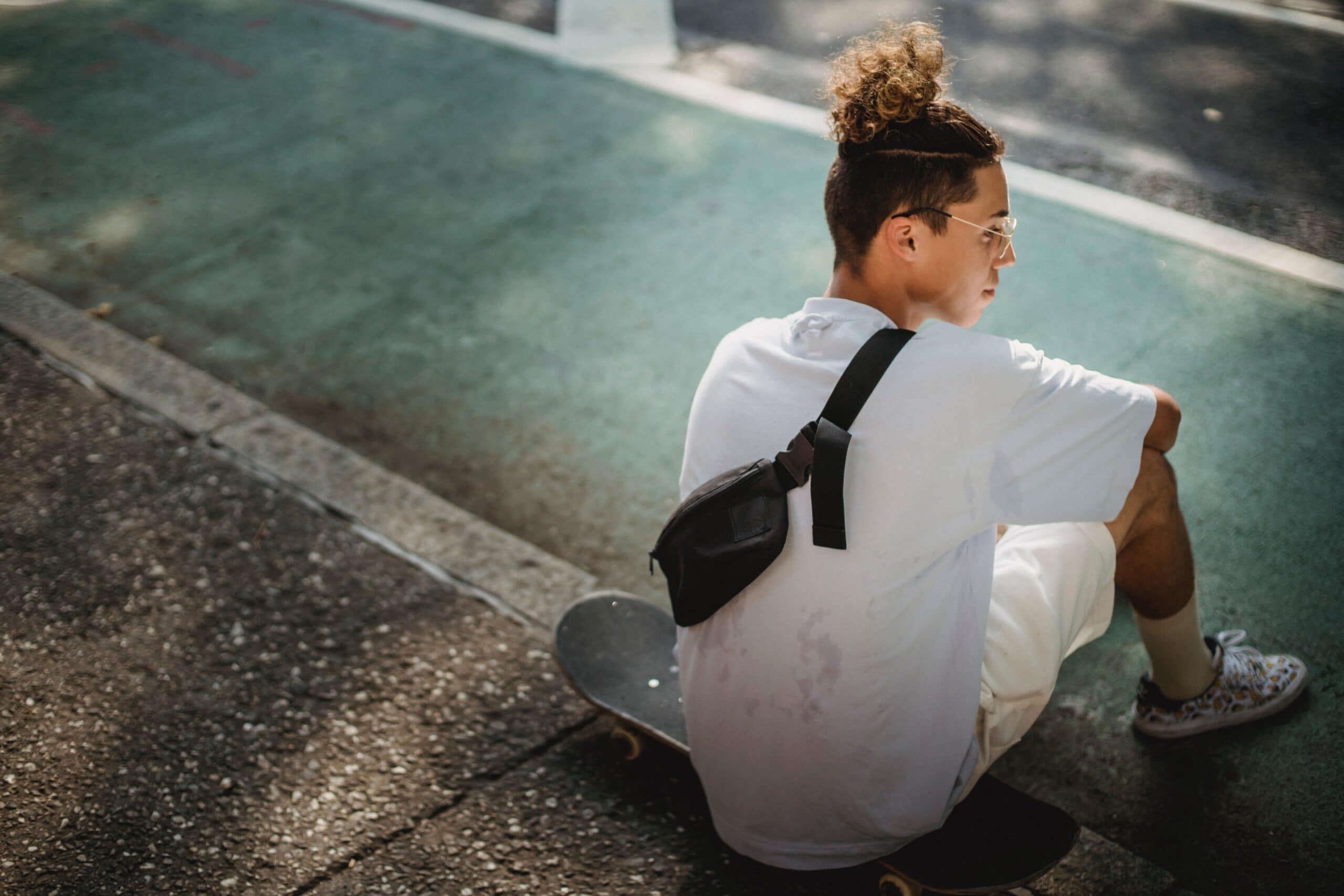 young man with skateboard thinking about opioids and benzos