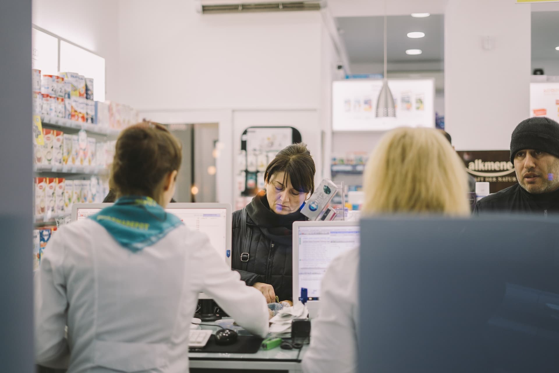 line of people one may have prescription pill addiction in pharmacy